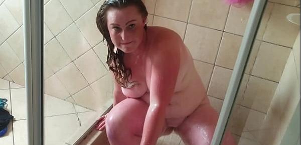  Busty fat girl gives sexy shower with pussy and mouth dildo play